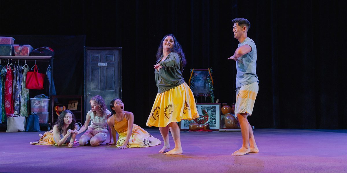 Conservatory students on stage performing iHula at Palikū Theatre.